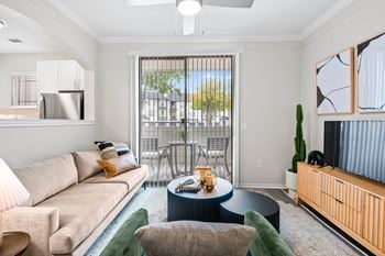 A living room with a couch and a coffee table